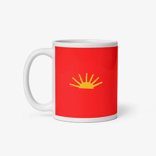 Timur Novikov "Sun" (Солнце) 1989 coffee mug. With yellow sun on red background on the front and logo on the back. Front side. www.timurnovikov.art